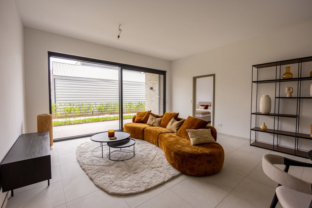 Zithoek met terrastoegang in een opgeleverd appartement van Veertien